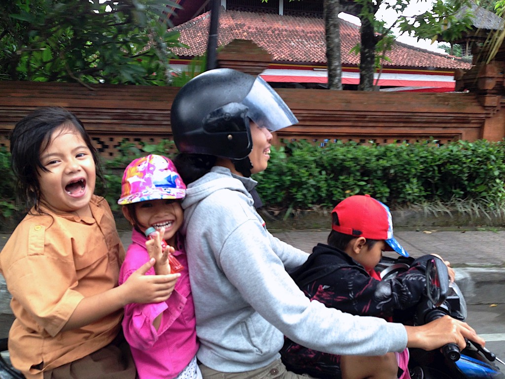 Omar Velazquez photo of people on a bike - Scoopshot