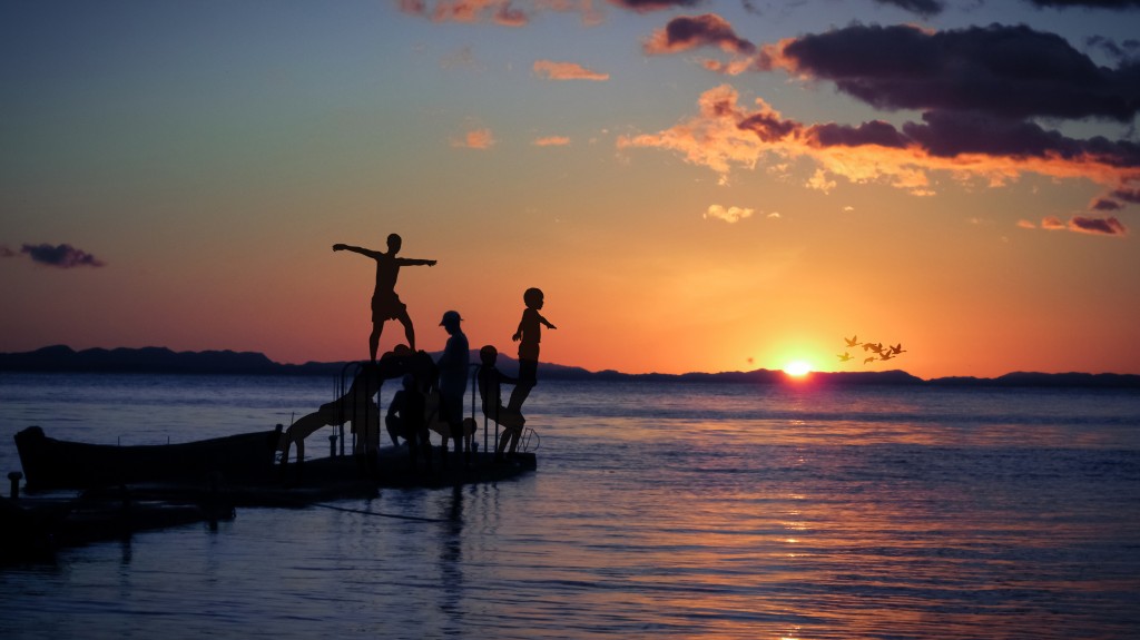 kids play at sunset